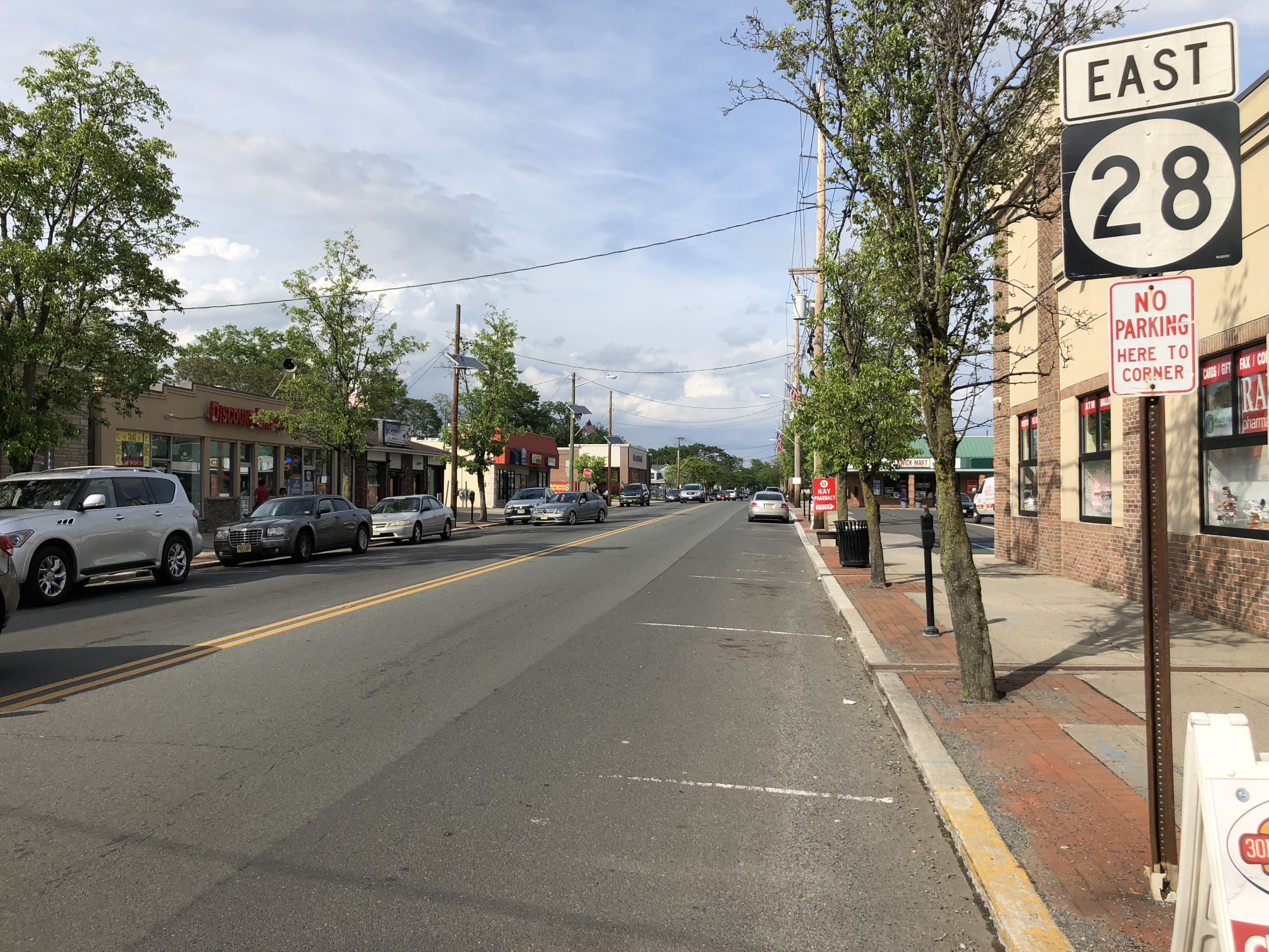 North Avenue (Route 28) at Washington Avenue in downtown Dunellen NJ showing the main commercial intersection of this Middlesex County borough